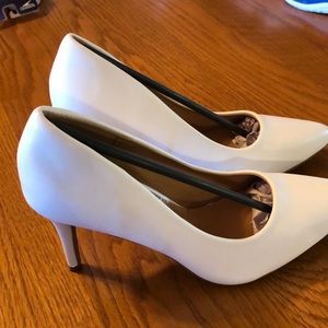 New, but no box or tags.  Trary white 3.5” high heel pumps.  Size 9
